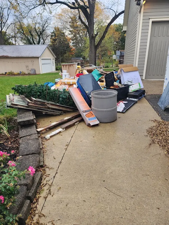 Dumpster being loaded with debris for Residential Dumpster Rental in Absecon